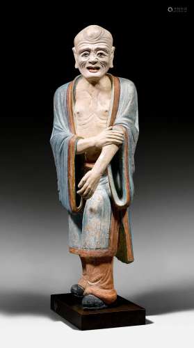 A PAINTED CLAY FIGURE OF A STANDING LUOHAN.