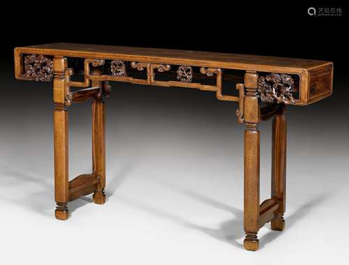 AN ALTAR TABLE WITH OPEN-WORK APRONS.