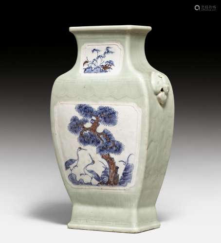 A CELADON VASE WITH UNDERGLAZE BLUE AND RED DECORATION.