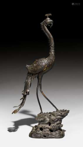 A LARGE BRONZE FIGURE OF A PEACOCK.