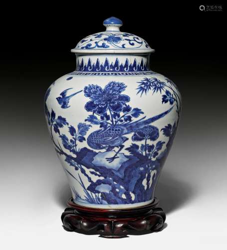 A BLUE  AND WHITE BALUSTER VASE AND COVER.
