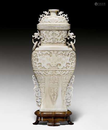 AN IVORY VASE AND COVER.