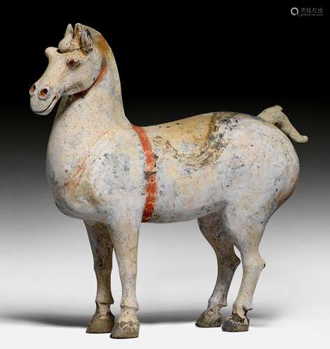 A WHITE PAINTED POTTERY HORSE.