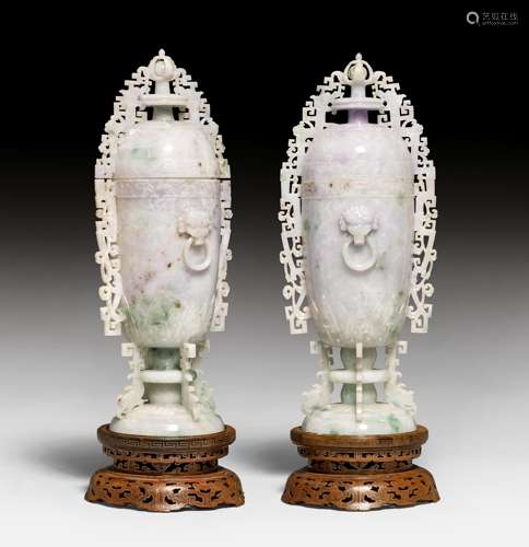 A PAIR OF CARVED VASES AND COVER.