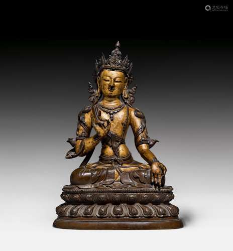 A SEATED BRONZE BODHISATTVA.