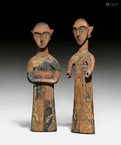 TWO STANDING FEMALE FIGURES.