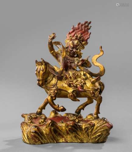 A LACQUER-GILT BRONZE FIGURE OF SHRIDEVI ON A HORSE