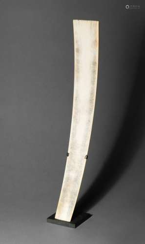 A LARGE IVORY 'HU' IN PLAIN TAPERING FORM