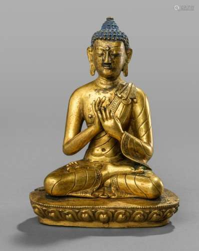 A GILT-BRONZE FIGURE OF BUDDHA SHAKYAMUNI