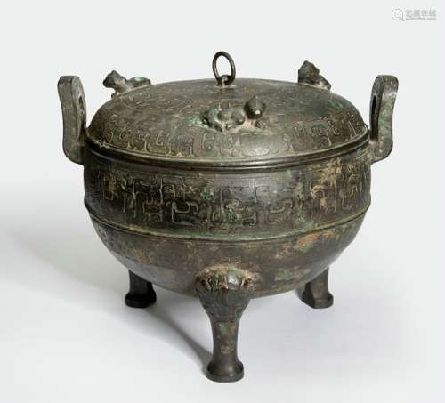 A BRONZE 'DING' WITH LID AND TWO CURVED U-SHAPED HANDLES