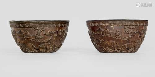 A PAIR OF FINELY CARVED COCONUT SHELL WINE CUPS