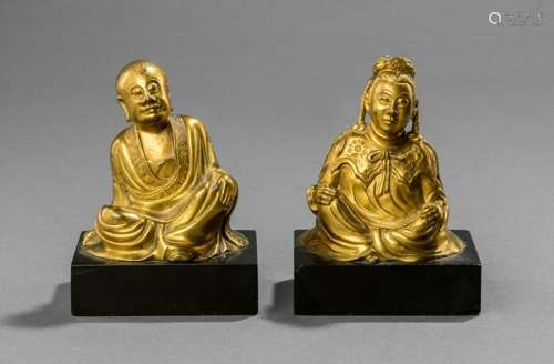 TWO GILT-BRONZE FIGURES OF A LUOHAN AND A FEMALE FIGURE