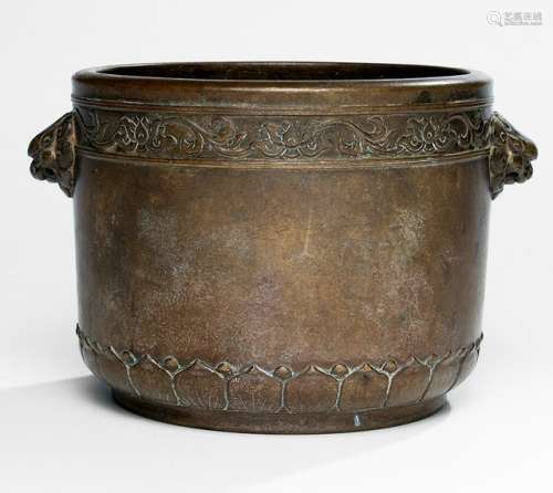 A CYLINDRICAL BRONZE CENSER WITH LOTUS DECORATION AND LION MASK HANDLES