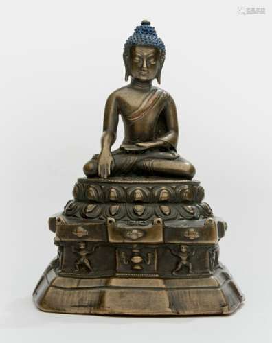 A BRONZE FIGURE OF AKSHOBHYA