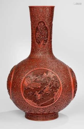 A FINE AND LARGE PAIR OF CARVED CINNABAR LACQUER VASES WITH FIGURAL SCENES FROM TEH NOVEL SANGUO YANYI