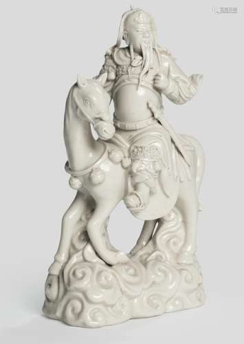 A DEHUA MODEL OF GUANDI RIDING ON A HORSE