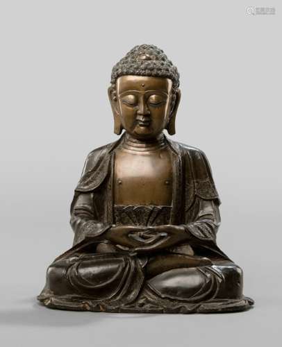 A BRONZE FIGURE OF BUDDHA SHAKYAMUNI