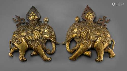 A PAIR OF FINE GILT-COPPER EMBOSSED PLAQUES DEPICTING ELEPHANTS