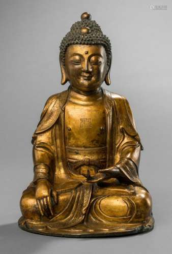 A GILT-BRONZE FIGURE OF BUDDHA SHAKYAMUNI