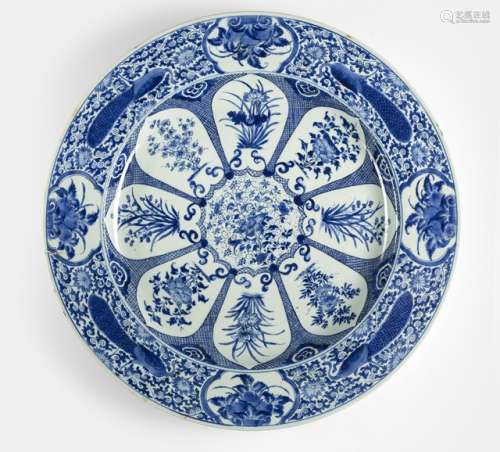 A LARGE BLUE AND WHITE PEACKOCK AND FLOWER BLUE AND WHITE PORCELAIN PLATE FROM THE COLLECTION OF AUGUSTUS THE STRONG (1670-1733)