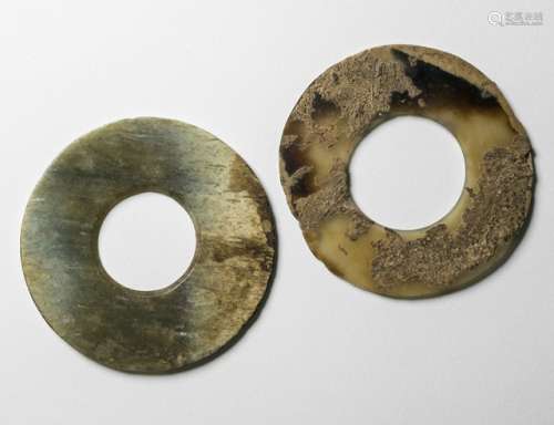 A SMALL ANNULAR 'YUAN' AND A 'HUAN' DISC OF CREAMY WHITE AND GREY-GREEN JADE