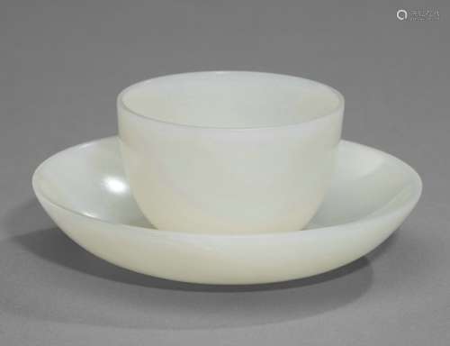 A FINE WHITE JADE CUP AND STAND