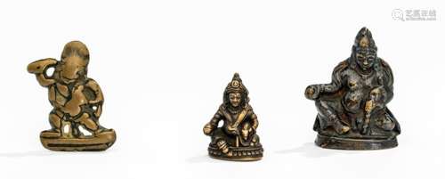 TWO BRONZE FIGURINES DEPICTING VAISHRAVANA AND ANOTHER OF VAJRAPANI