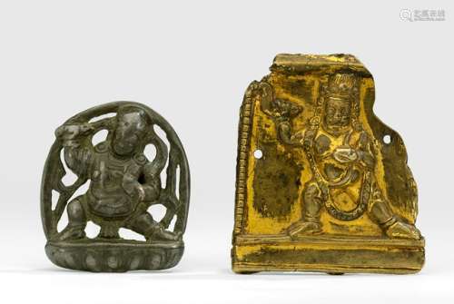 A GILT-COPPER PLAQUE WITH A WRATHFUL DIVINITY AND A METAL PLAQUE WITH VAJRAPANI
