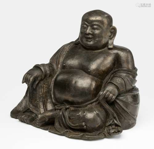 A BRONZE FIGURE OF SEATED BUDAI