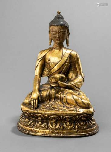 A GILT-BRONZE FIGURE OF BUDDHA SHAKYAMUNI