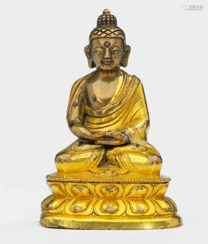 A PARCEL GILT-BRONZE FIGURE OF BUDDHA SHAKYAMUNI, Tibeto-Chinese, 18th ct., seated in vajrasana on a lotus base with both hands in dhyanamudra, wearing a monastic garment and his face displaying a serene expression with downcast eyes, unsealed - Property from an old European private collection, assembled prior 1990 - Minor wear