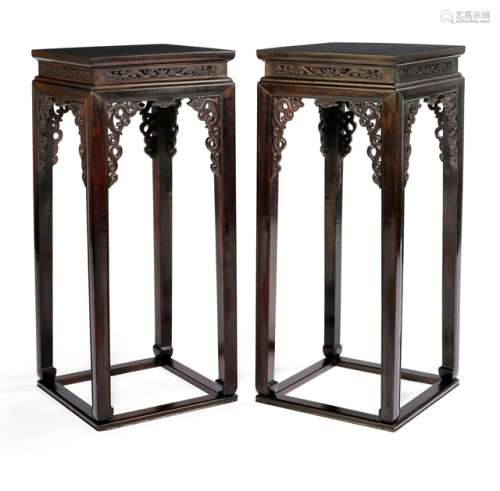 A PAIR OF HARDWOOD STANDS, China, 19th Ct.  with dragon-carved aprons - Cf.: Curtis Evarts, A Leisurely Pursuit, 2000, page 246/147, no. 48 - Property from a Scandinavian private collection, acquired before 1990 - Both tops have been repaired, three/one replaced aprons
