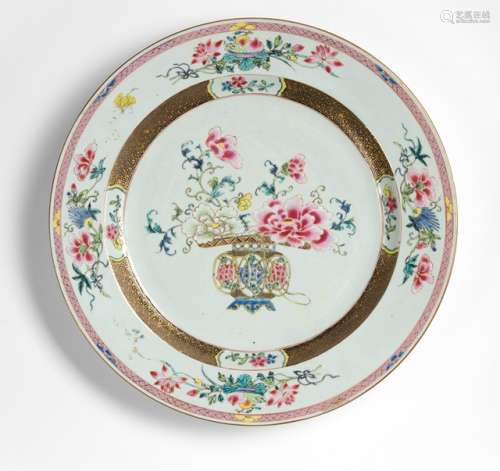 A LARGE FAMILLE ROSE EXPORT PORCELAIN PLATE WITH A FLOWER BASKET, China, Qianlong period - Property from a German private collection, bought prior 1987 from the August Warnecke collection, Hamburg - Short hairline to rim, very minor wear to enamels