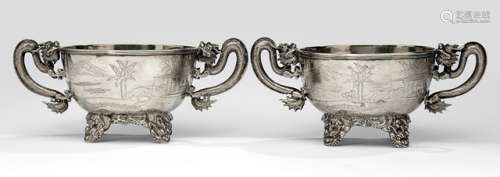 A PAIR OF LANDSCAPE ENGRAVED SILVER BOWLS WITH DRAGON HANDLES, China, marked Wen-Wo and Shanghai, late Qing dynasty - Property from an old German industrialist collection, assembled between 1950 and 1990 - Very slightly chipped