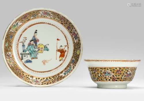 A DOUBLE-WALLED AND OPENWORK PORCELAIN CUP AND SAUCER, China, Qianlong period. Both pieces with a decor of a boy training his dog - Property from an old Belgian private collection, assembled between 1890 and 1940, by descent to the present owner - Minor wear