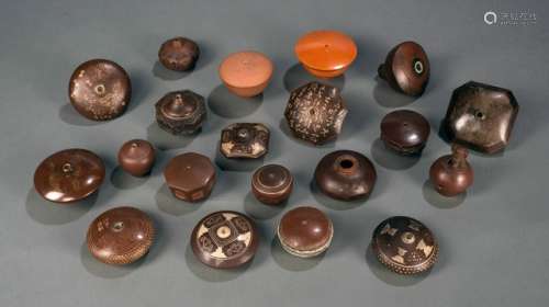 A GROUP OF TWENTY 'ZISHA' OPIUM PIPE-BOWLS OF VARIOUS SHAPES AND DECORATIONS, China, late Qing dynasty, some bowls bearing stamped or incised marks, some inscribed - Property from a German private collection, ex. Wolf K. Collection on Opium Smoking. Most of the collection is published in Flow, K.: The Chinese Encounter with Opium, 2009. Pieces of this lot feature on p. 302, further comparable pieces on pp. 256 to 308 - Traces of use, some metal/bronze mountings missing, one pipe-bowl restuck