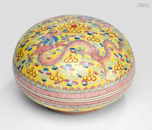 A LARGE YELLOW-GROUND FAMILLE ROSE DRAGON PORCELAIN BOX AND COVER, China, late Qing dynasty - Property from a German private collection, since at least 1982 in the property of the present owner - Very minor wear