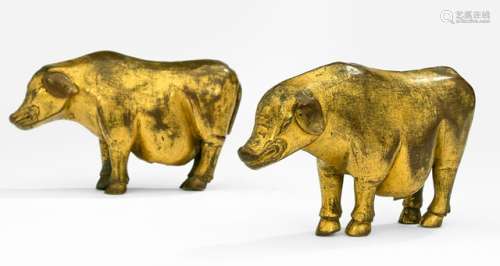 A PAIR OF GILT BRONZE BOARS OF A MARICI GROUP, Tibet, ca. 18th ct., both standing foursquare, their slightly lowered heads incised with eyes, snout, pair of long ears and their bodies with hanging bellies and tail - Property from an European private collection, assembled prior 1990 - Few dents, wear, very short breaks