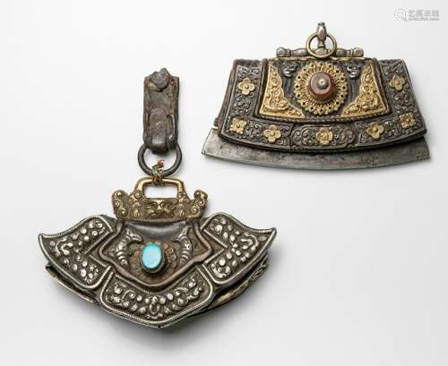 TWO PARCEL SILVER, METAL AND LEATHER TINDER POUCHES, TIBET, 19th ct., both lozenge-shaped leather pouches decorated with silver ornaments embellished with various musters around a large central bead - Property from an old German family collection, assembled prior 1990 - Traces of age