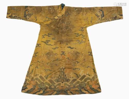 A YELLOW SILK ROBE WITH WOVEN PATTERN OF EIGHT 'MANG' DRAGON ROUNDELS ABOVE LISHUI AND MOUNTAIN PATTERN, Tibeto-Chinese, 18th/19th ct. - Wide cut sleeves, otherwise similar to 'jifu' semi-official robes of the Qing period, possibly the garment of a priest or person of the imperial household holding a princely rank - From an Italian collection, purchased in 1973 - The lower seam modified, traces of age, the flaps, shoulders and breast stained