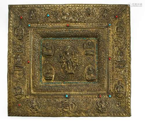 AN INLAID COPPER RITUAL TRAY, NEPAL, 19th ct., the rectangular tray  decorated with Amoghapashalokeshvara in the centre standing on a lotus base, his eight arms radiating around him, surrounded by four deities including Manjushri and Prajnaparamita, within a broad border set with various deities and Buddhist emblems, all amongst scrolling tendrils set with various beads and its reverse engraved with some mantra's - Property from an important American private collection of Tibetan art, bought from Scott G. Boulder, Colorado 1997 - Traces of age