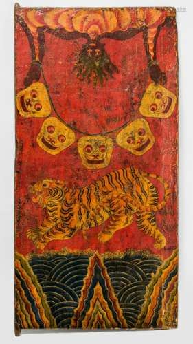 A LARGE PAINTED WOOD DOOR PANEL, TIBET, late 19th ct., the rectangular door panel painted to the front with a central tiger placed above the primordial waters set with some mountain peaks, the upper section decorated with a human-skin holding a string with five skulls, all placed against a red background, its reverse deprived of any decoration - Property from an old Dutch private collection, assembled from 1950 till the 1990s, by descent to the present owner - Minor damages due to age