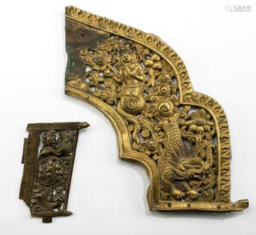 TWO COPPER EMBOSSED AUREOLE FRAGMENTS, Tibet, 16th-18th ct. The larger gilded fragment embossed with a pierced design of a nagaraja and a makara amongst scrolling tendrils; and the smaller fragment embossed with a Gandharva holding the hands in anjalimudra and equipped with a large scrolling floralized tail - Property from an Austrian private collection, acquired prior to 1990 - The smaller plaque with very minor purple residue, both slightly chipped, minor wear