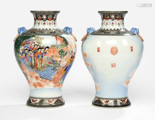 A PAIR OF POLYCHROM DECORATED PORCELAIN VASES, China, blue enamel Qianlong marks, 20th ct. - Property from an European private collection - Good condition