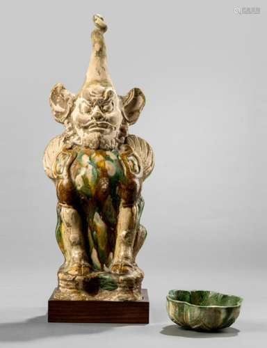 A 'SANCAI' TOMB GUARDIAN FIGURE AND A SMALL LOBED'SANCAI' BOWL, China, Tang dynasty - Provenance: Property from a European private collection, acquired before 1990 - Guardian figure rest., bowl with traces of age