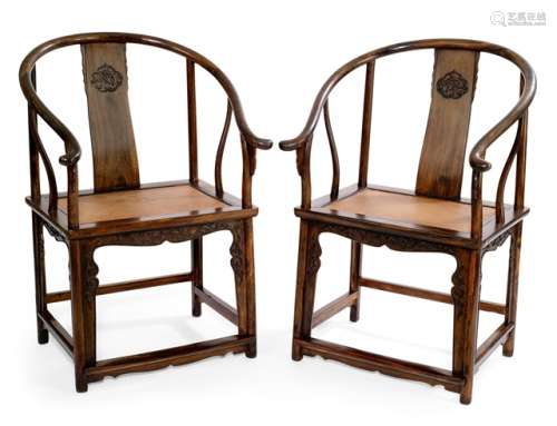 A PAIR OF ZITAN HORSESHOE CHAIRS, China, 19th Ct., with dragon-carved aprons and soft seat - Cf. Nancy Berliner: Beyond the Screen, 1996, page 112/113, no. 11  - One replaced bottom apron, some minor damage to one front foot