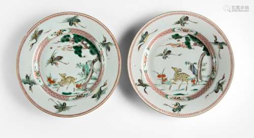 A PAIR OF 'FAMILLE VERTE' PLATES WITH DECOR OF CRANE AND DEER, China, Kangxi period - Property from an old Belgian private collection, assembled between 1890 and 1940, by descent to the present owner - Minor chip to one plate's rim, minor wear