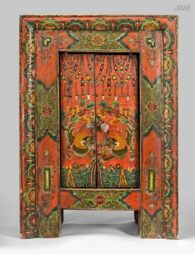 A PAINTED WOOD SHRINE, TIBET, LATE 19th ct., the rectangular shrine with a pair of hinged doors painted with a pair of makara's above the primordial waters and its upper section with swaying tassels, the frame painted with lozenge-shaped medallions containing each a flower placed within the rim decorated with petals, both sides and backside deprived of any decoration - Property from an old Dutch private collection, assembled from 1950 till the 1990s, by descent to the present owner - Minor damages due to age