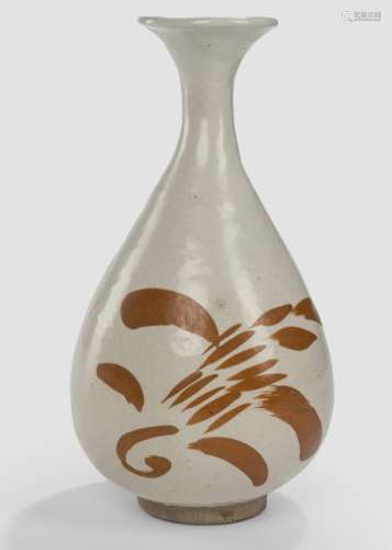 A RARE CIZHOU CREAM-GLAZED STONEWARE BOTTLE (YUHUCHUN PING) WITH PERSIMMON FOLIATE DESIGN, China, Heibei province, Jin dynasty - Property from a Bavarian private collection, bought 1996 from Asianantiques - Cf. Krahl 'Chinese Ceramics from the Meiyintang Collection', Vol. II, no. 1519 (for a similar design) - Good condition