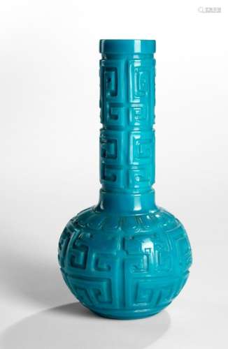 A DEEP CUT TURQUOISE-BLUE BEIJING GLASS BOTTLE VASE WITH DRAGON DECORATION, China, engraved Qianlong four-character mark, 18th/19th ct. - Provenance: From the collection of a member of the Family Baron von Goldschmidt-Rothschild, formerly Palais Grüneburg, Frankfurt on the Main - Glass bubbles, few tiny chips